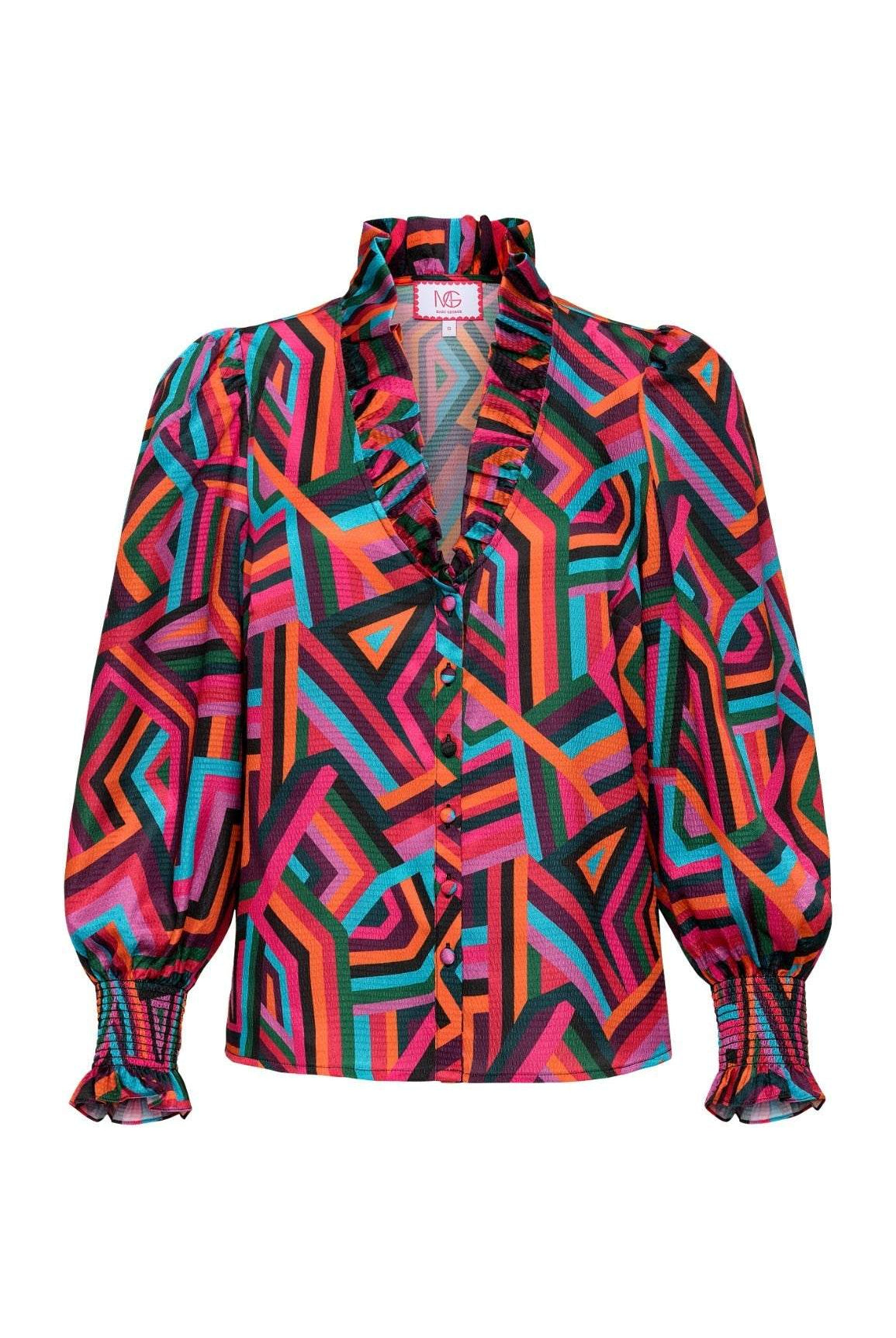 Colorful geometric patterned Harper Top with ruffle neckline and gold button details